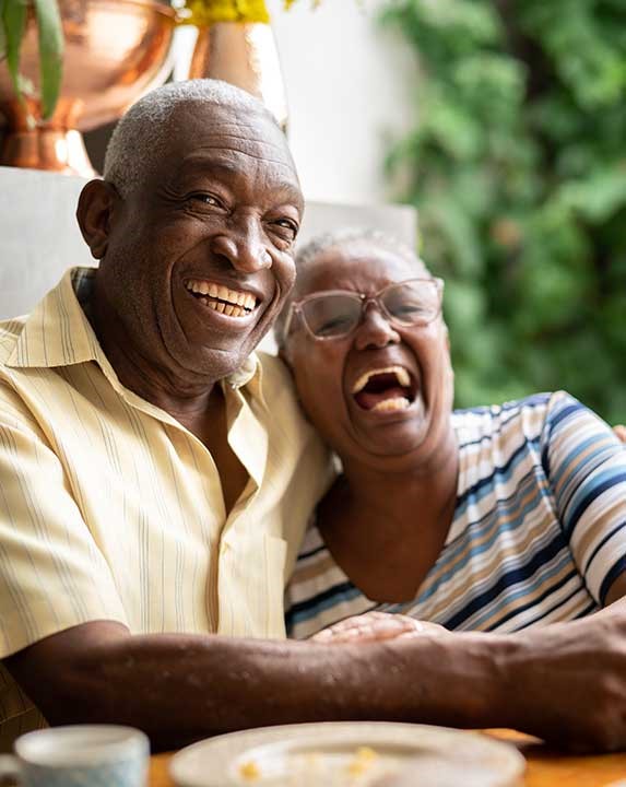 Happy couple laughing